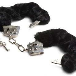 Frisky Couples Caught In Candy Handcuffs -